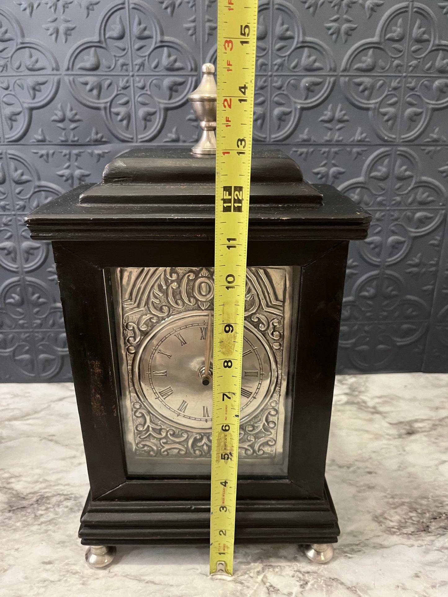 Black and tin Bracket Clock
