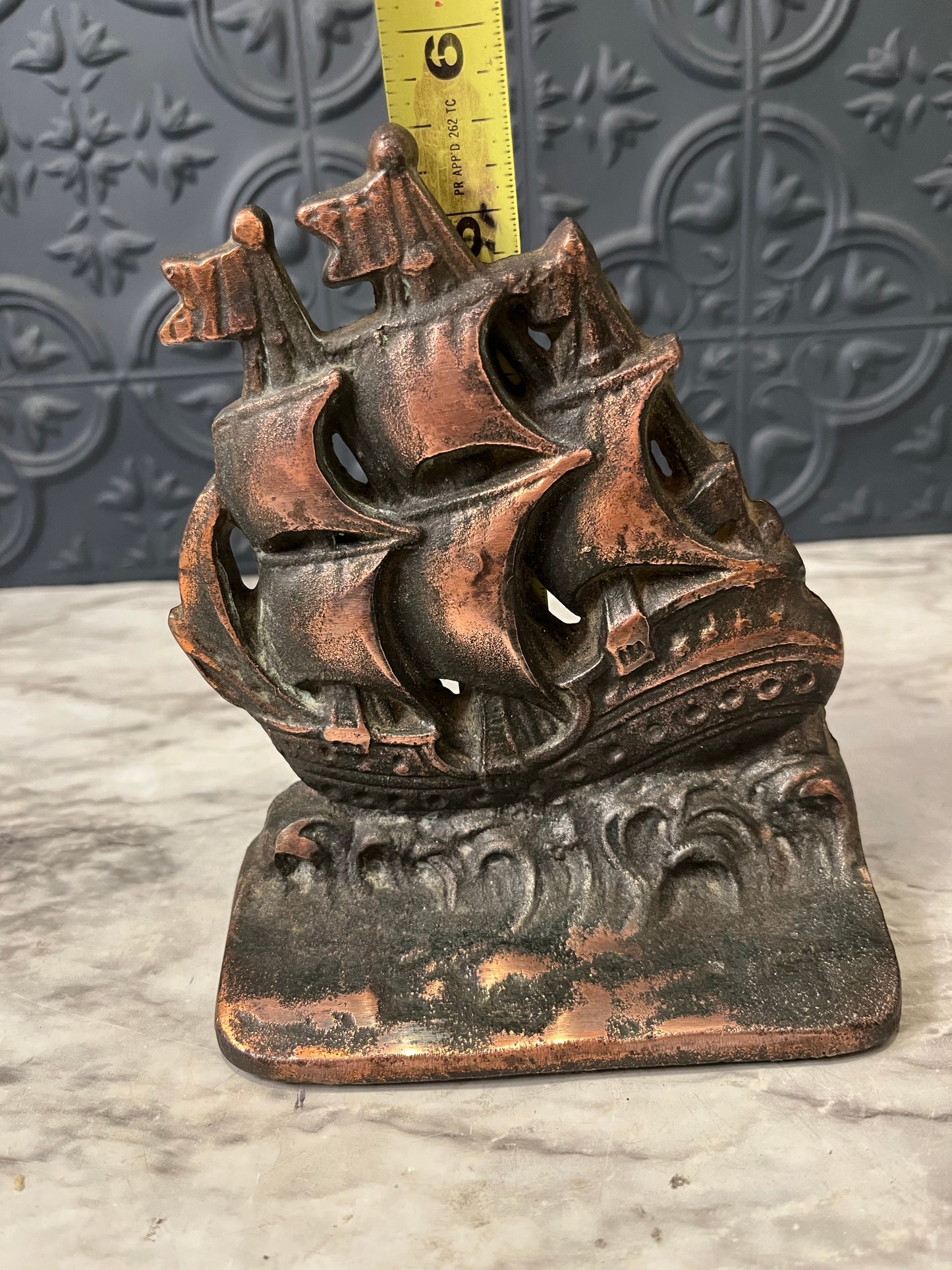 Metal ship bookend or Doorstop