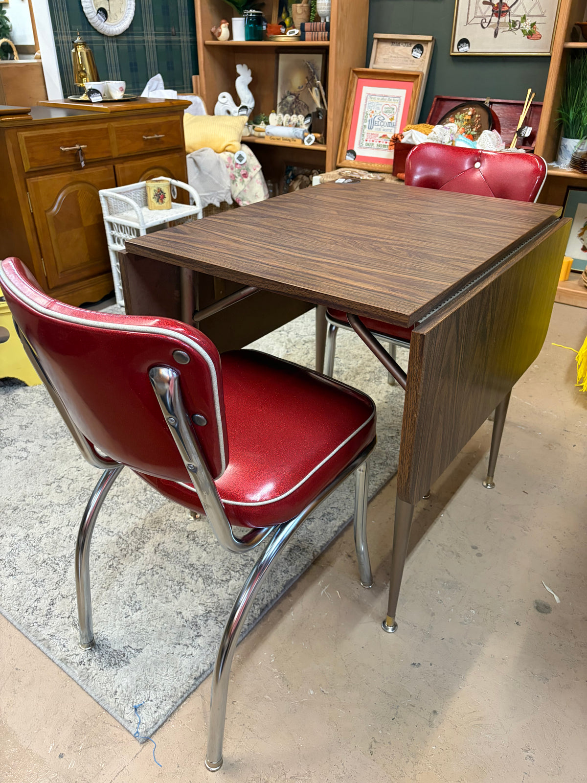 Walter of Wabash Formica drop leaf table and 2 Red vinyl Chairs