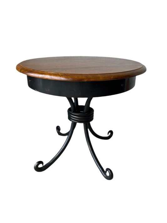 Black metal table with wood top