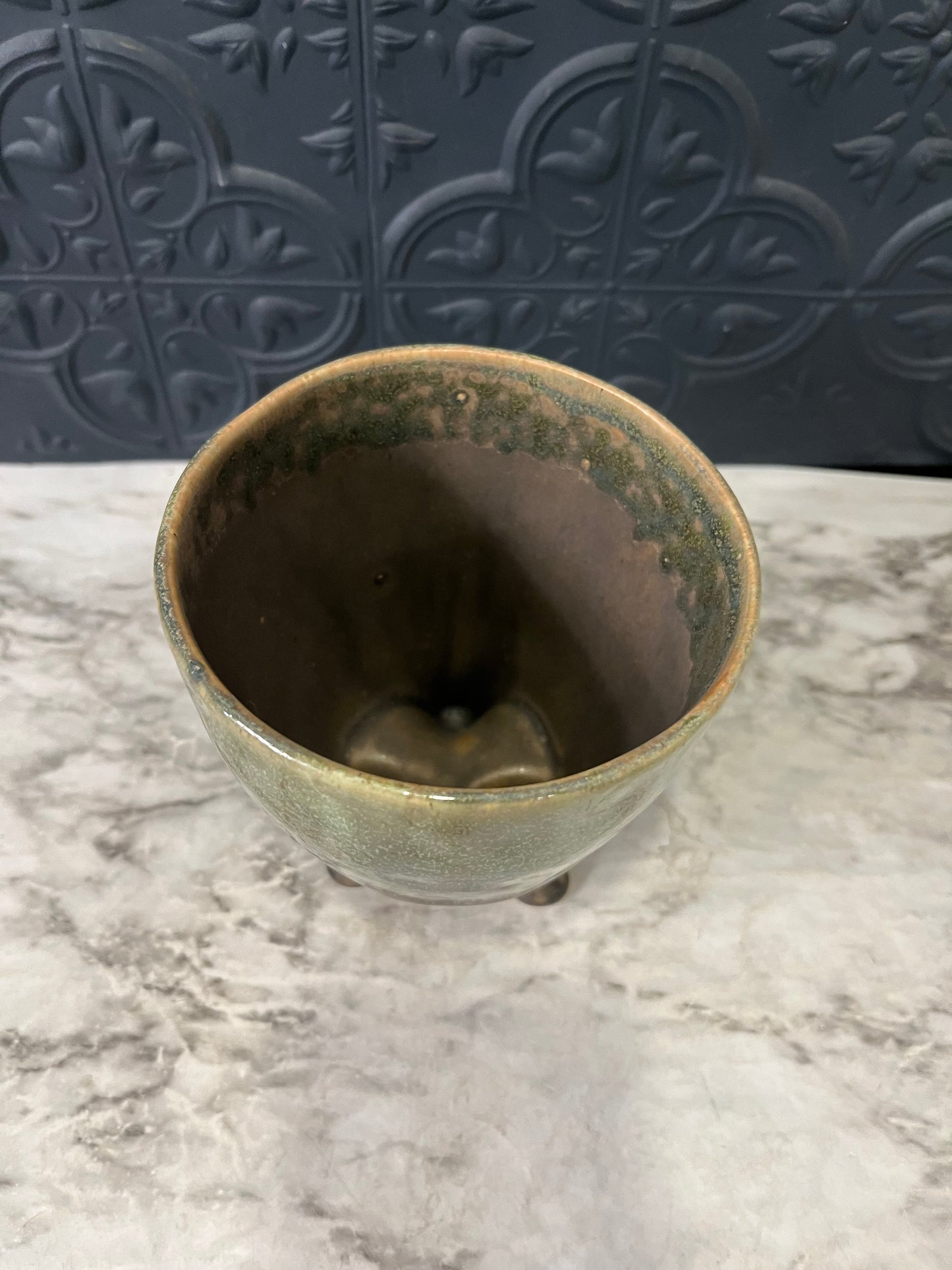 Green and Brown planter with 3 feet