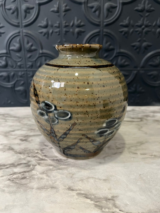 Small Ribbed Pottery Vase with Flowers