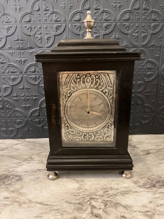 Black and tin Bracket Clock