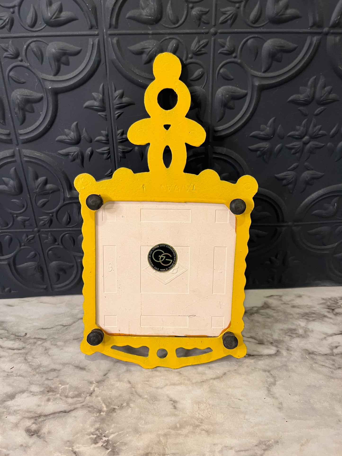 Metal Yellow Trivet Foul Work