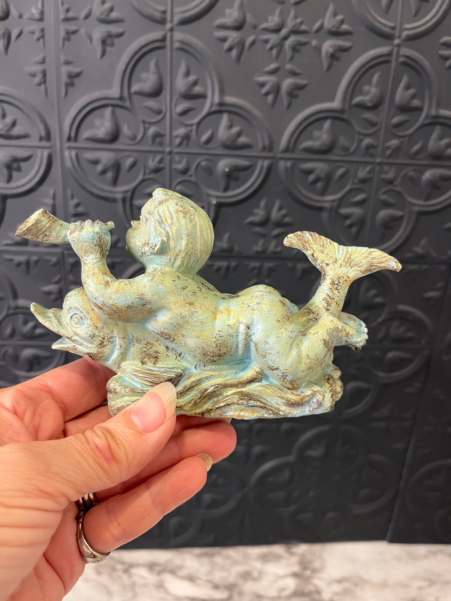 Vintage Child Riding a Dolphin Cast iron
