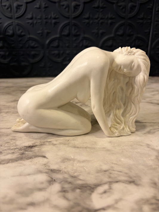 Nude Woman Bent over Statue