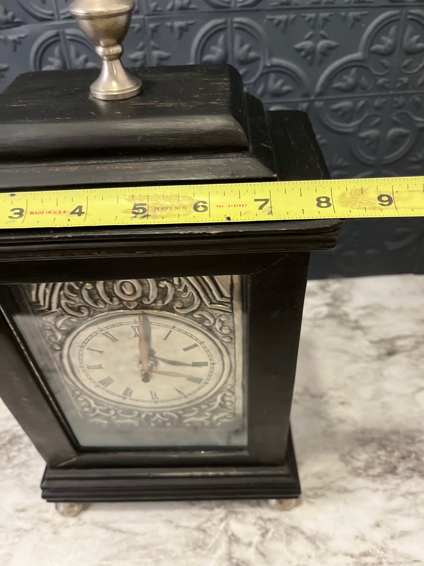 Black and tin Bracket Clock