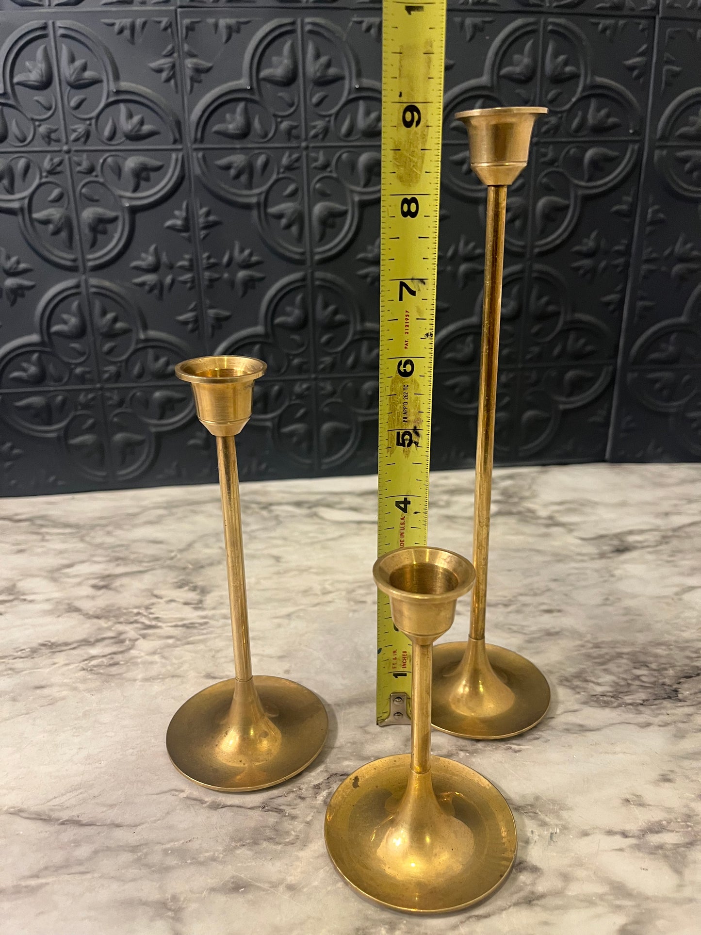 Set of Three Brass candlesticks