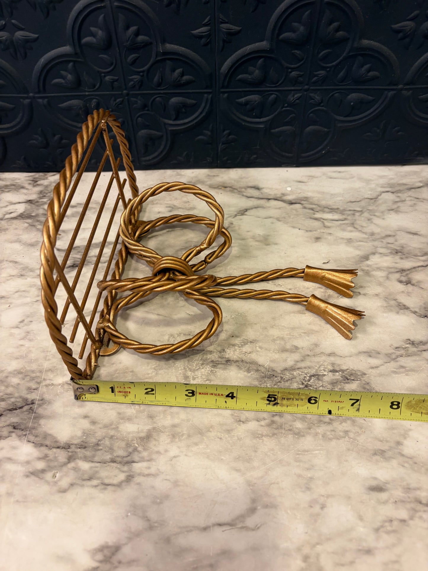 Twisted Gold Metal Bow Shelf
