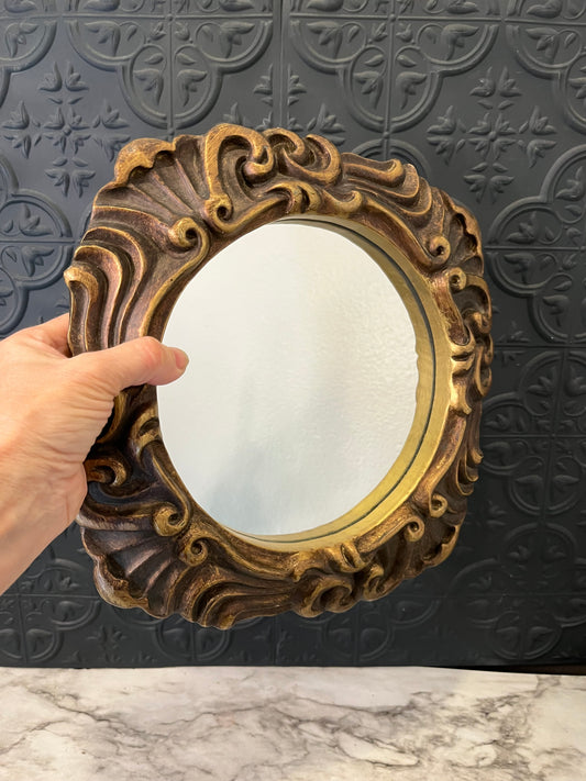 Ornate round mirror with resin frame 11"