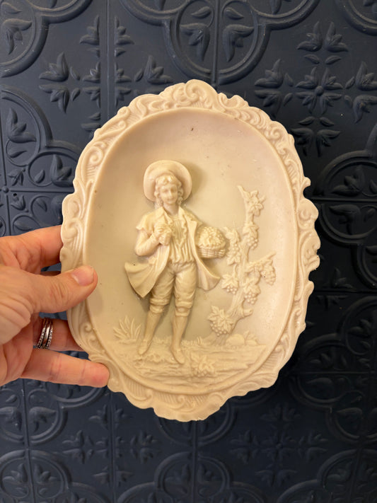 Bisque 3D Plaque of Woman Holding Basket of Fruit