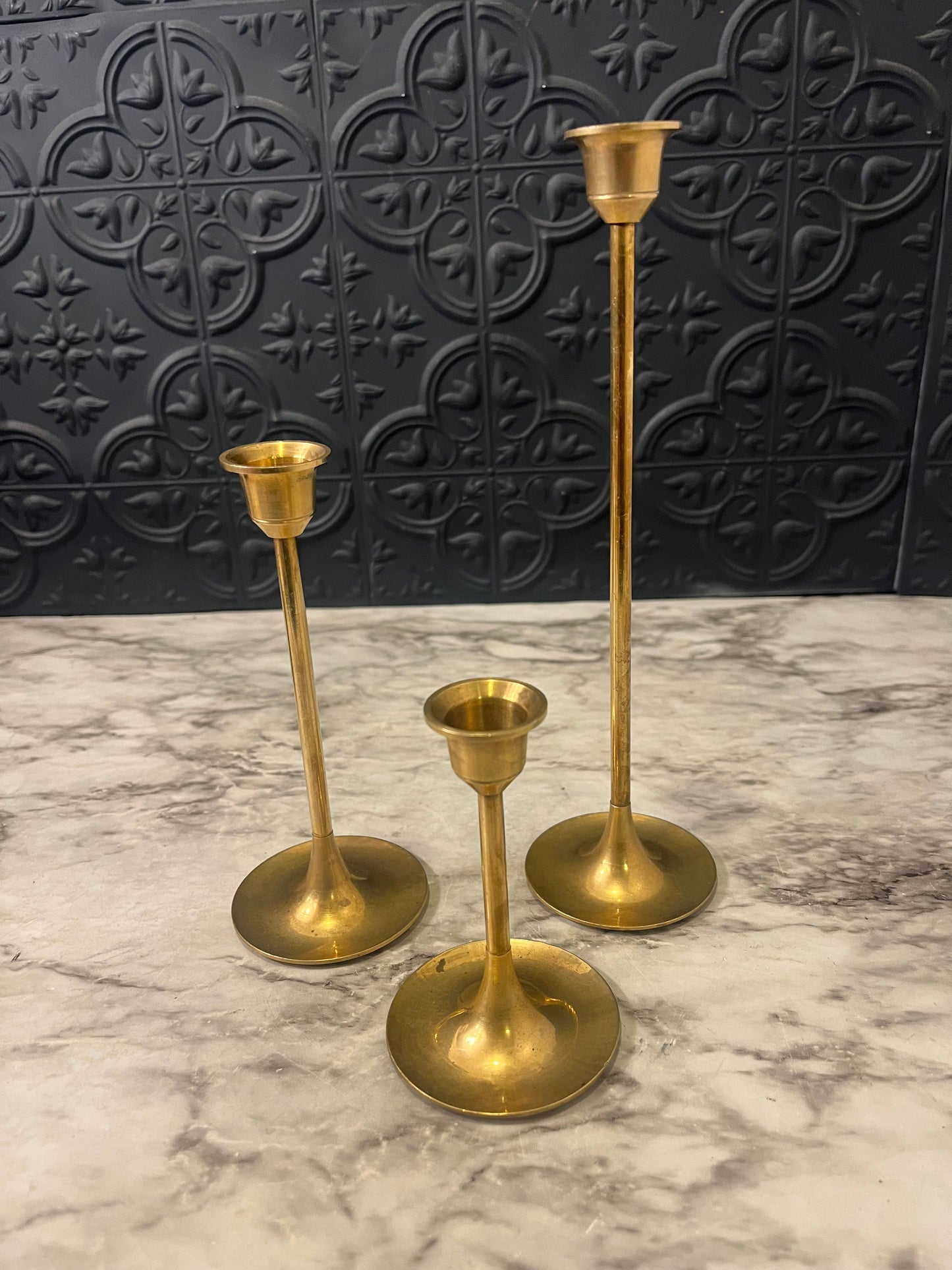 Set of Three Brass candlesticks