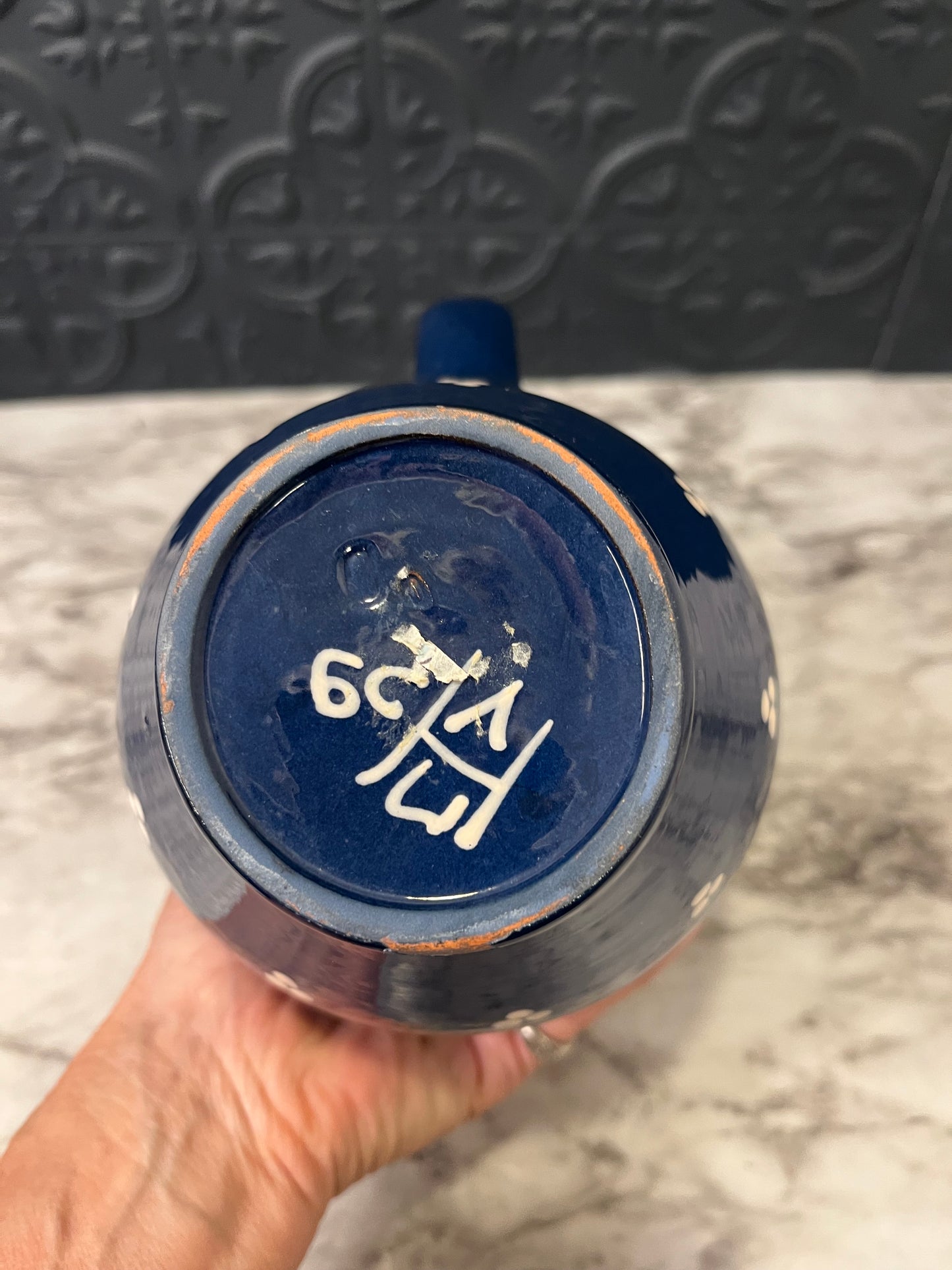 Blue and White Pitcher with White Dot Design