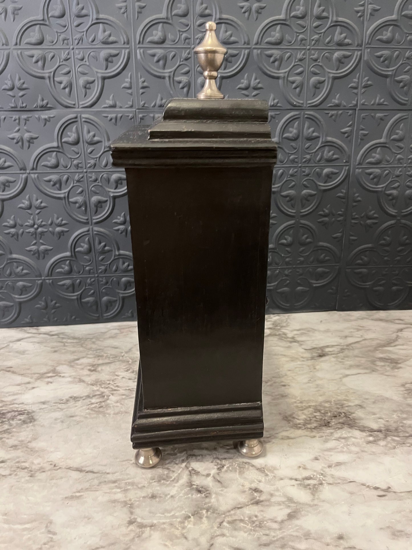 Black and tin Bracket Clock