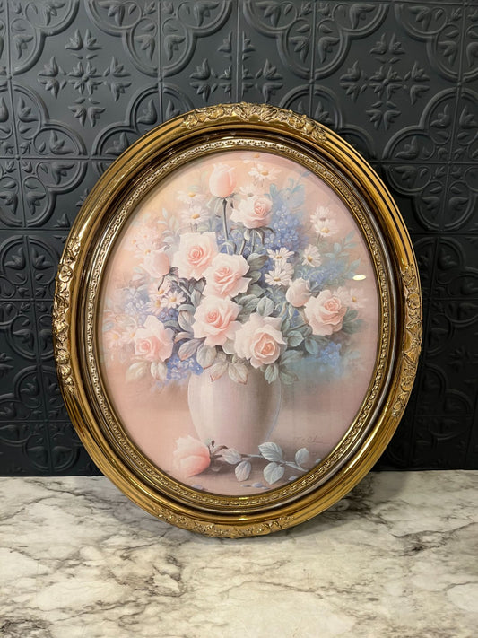 Floral print in gold plastic oval frame