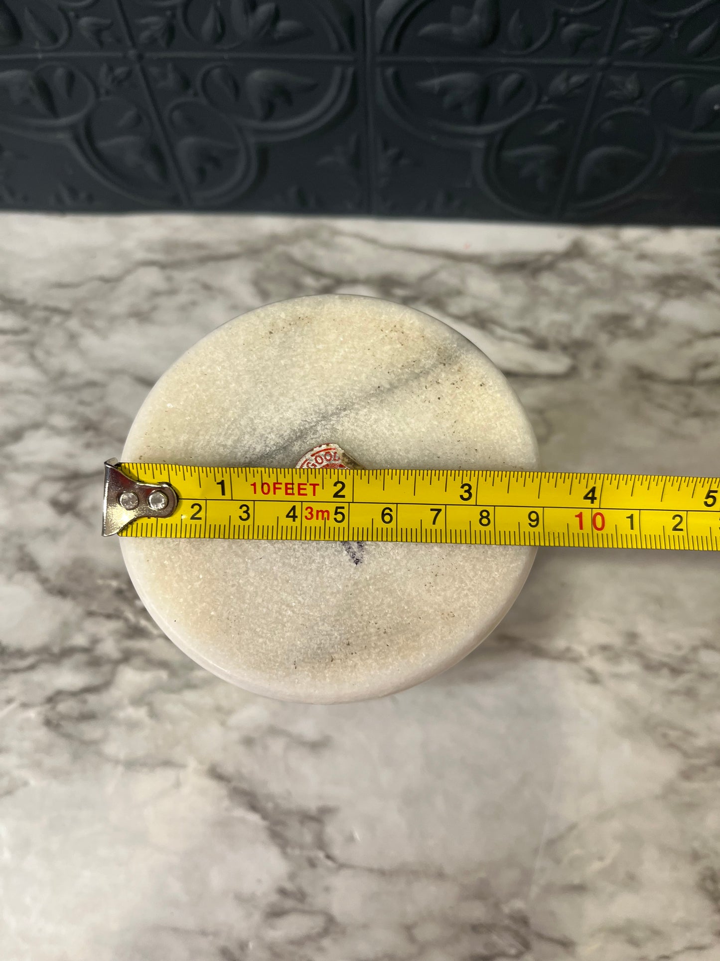 White marble candle holder flared base