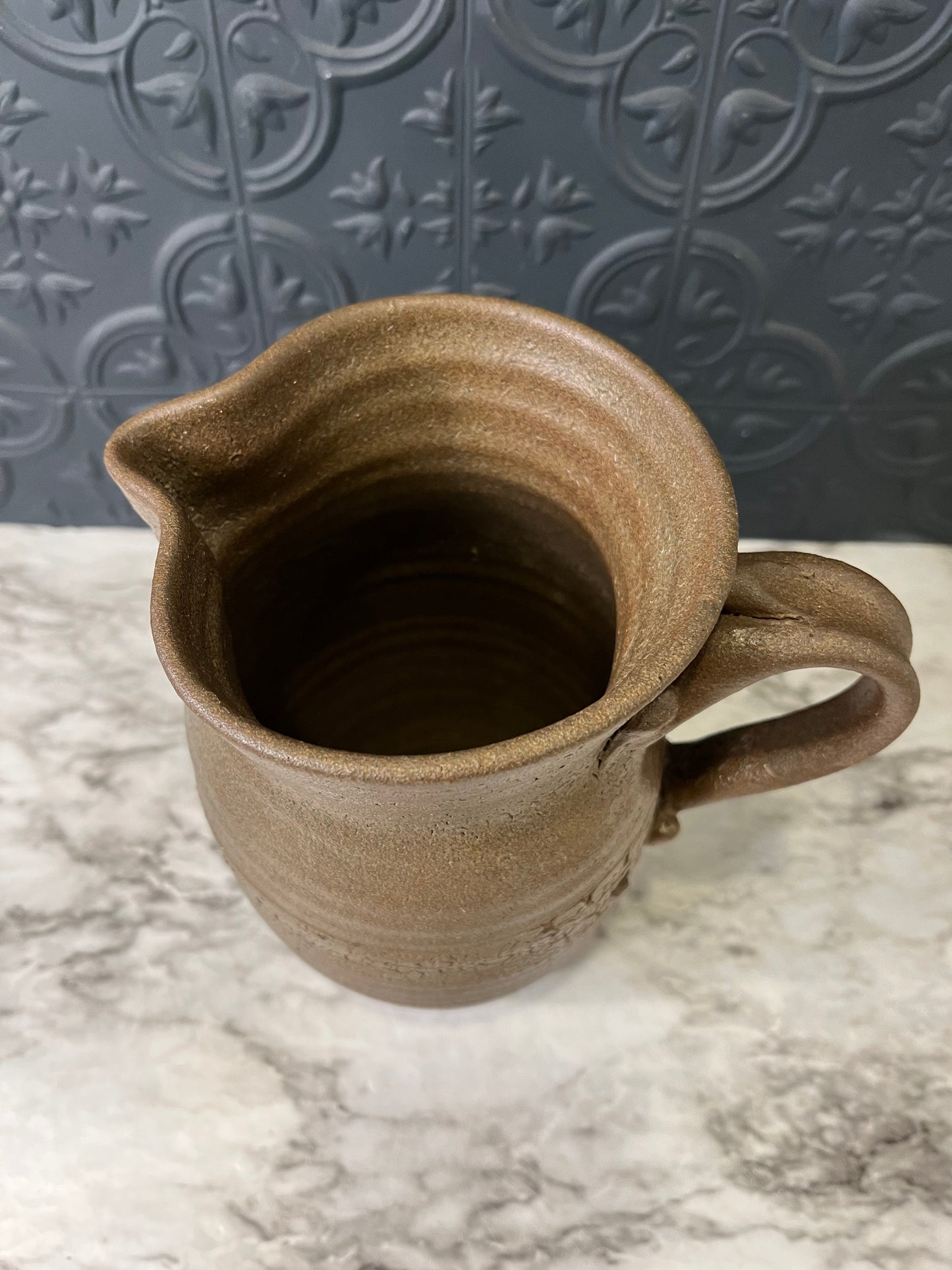 Brown Pottery Pitcher