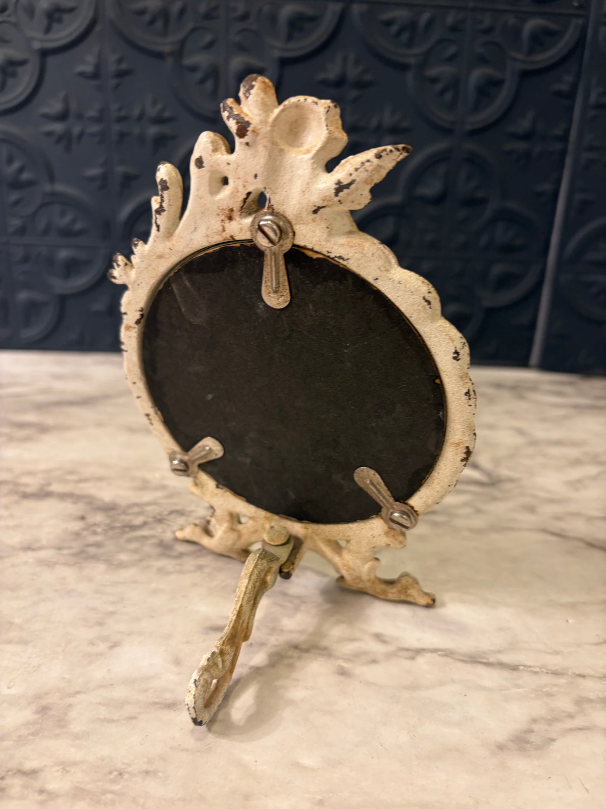 Small Cream metal Cherub Mirror