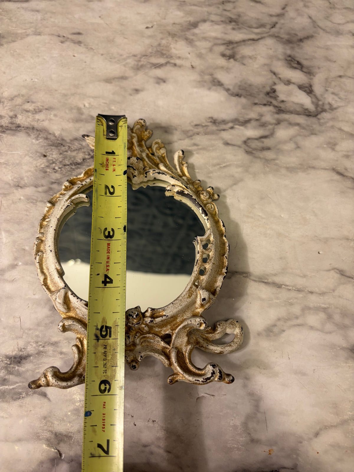 Small Cream metal Cherub Mirror