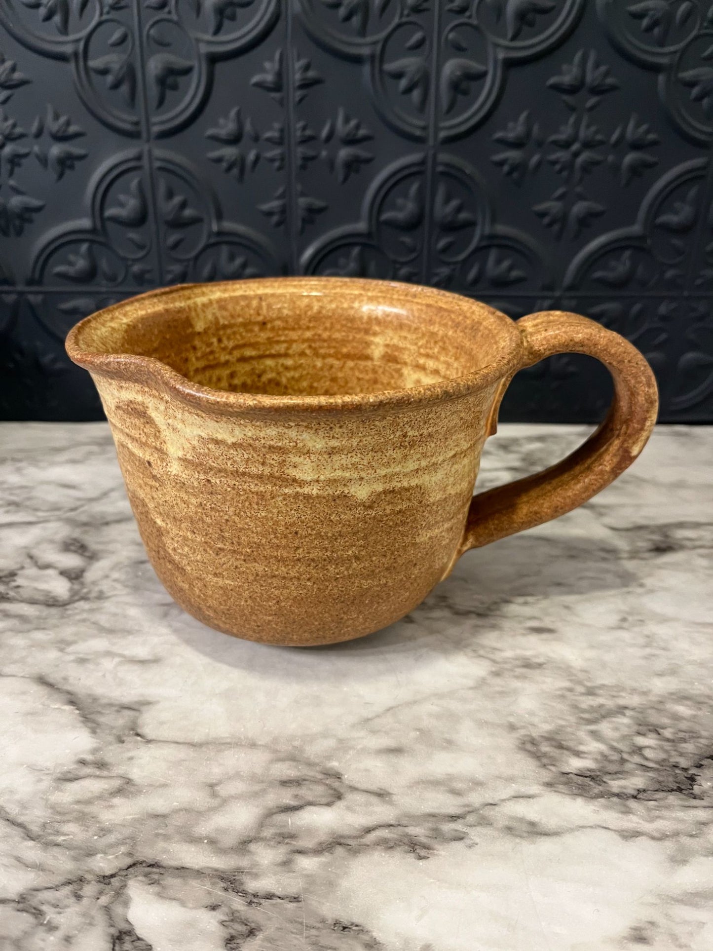 Pottery mug with Spout