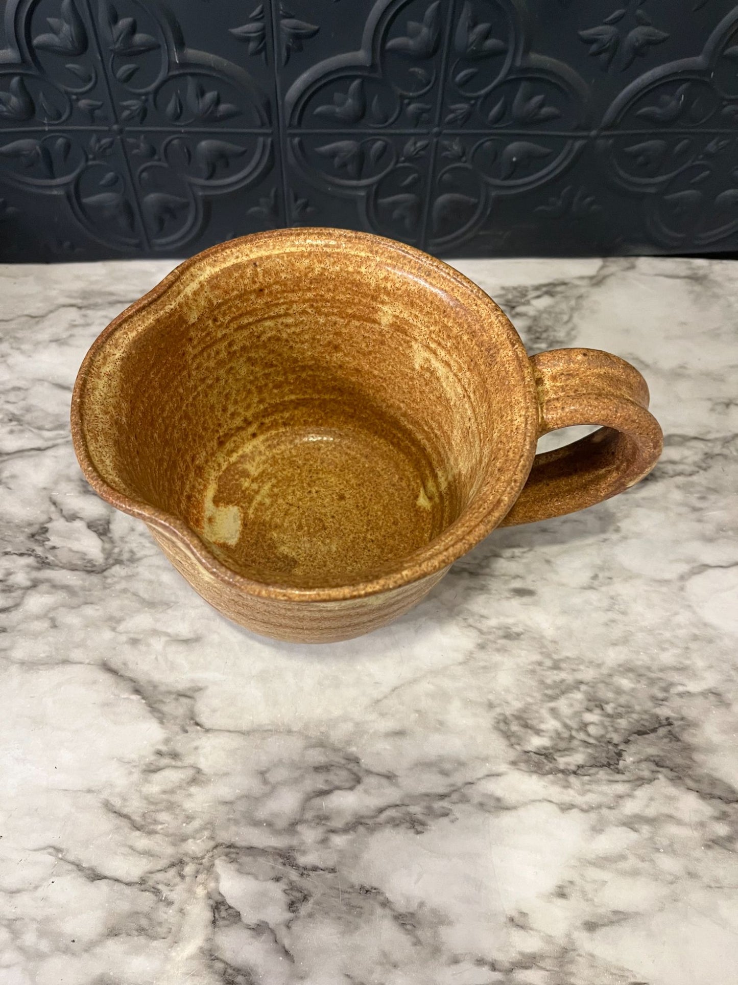 Pottery mug with Spout