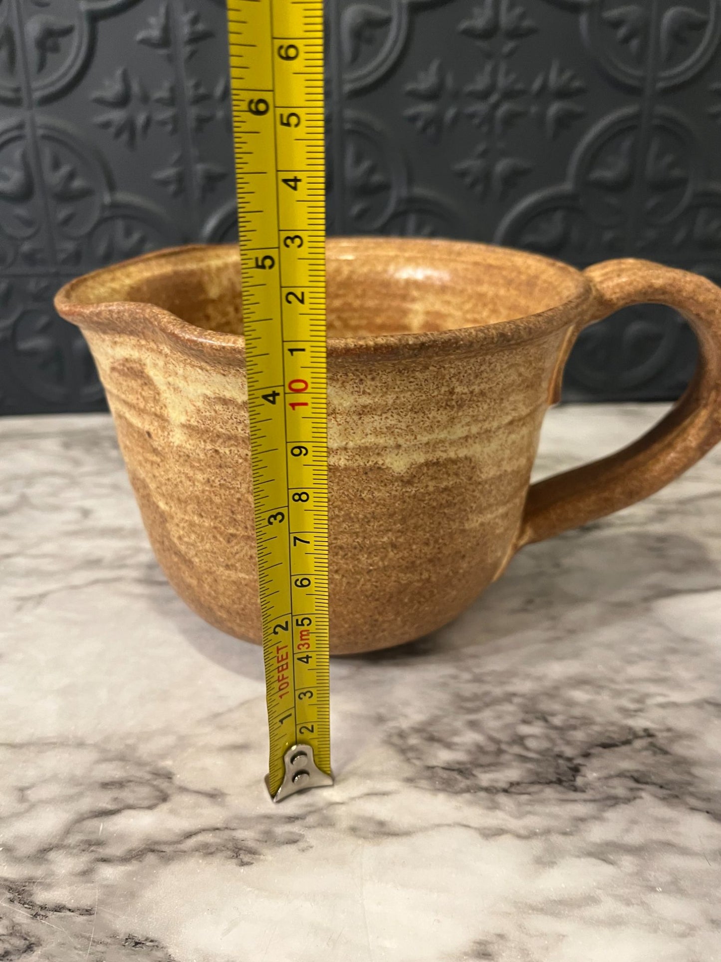 Pottery mug with Spout