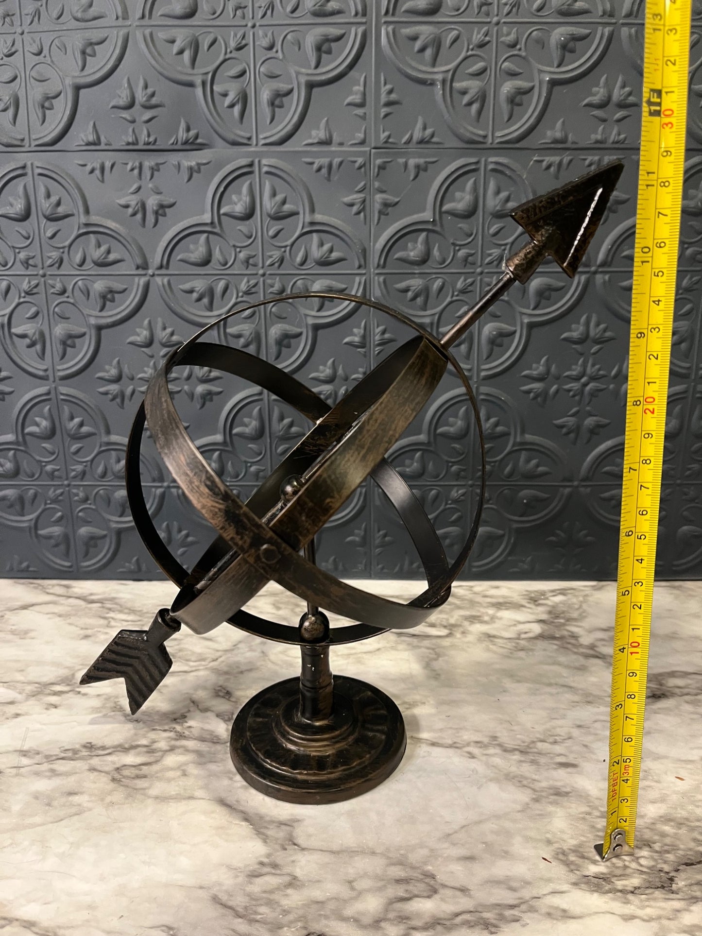 Metal Sphere with Arrow