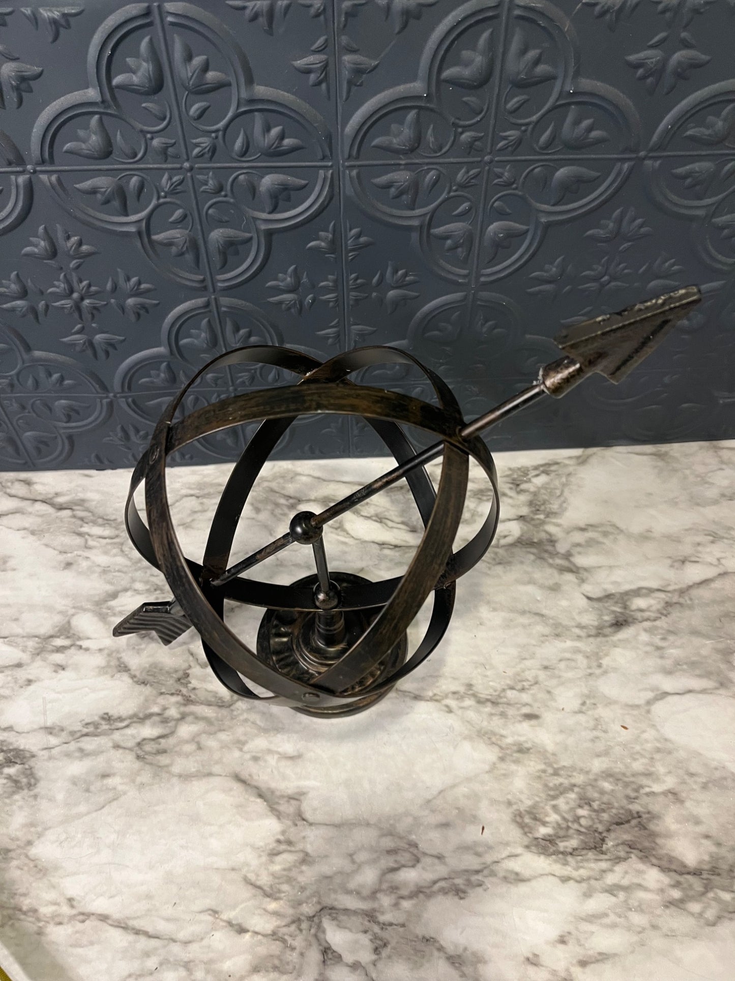 Metal Sphere with Arrow