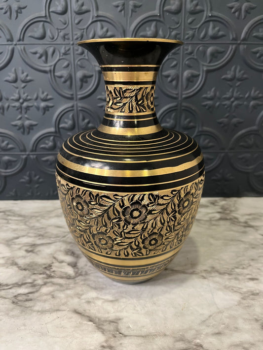 Brass and black etched vase with flowers