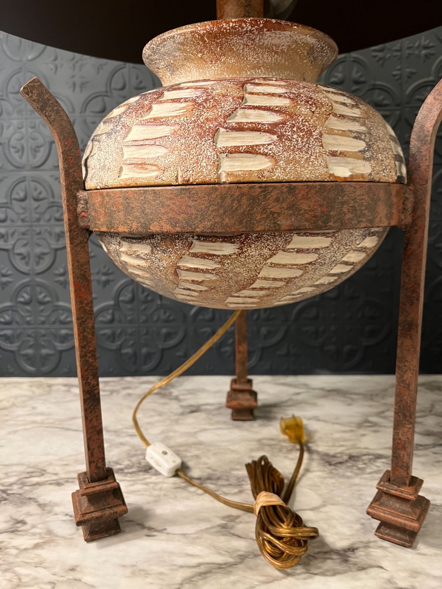 Metal and pottery lamp