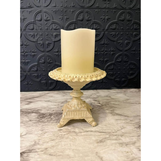 cream cast iron pillar candle holder