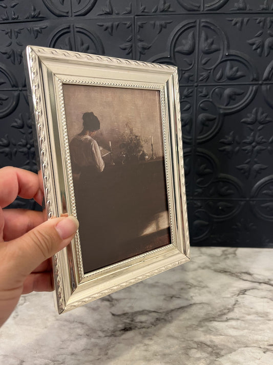 Lady Reading in Silver Frame