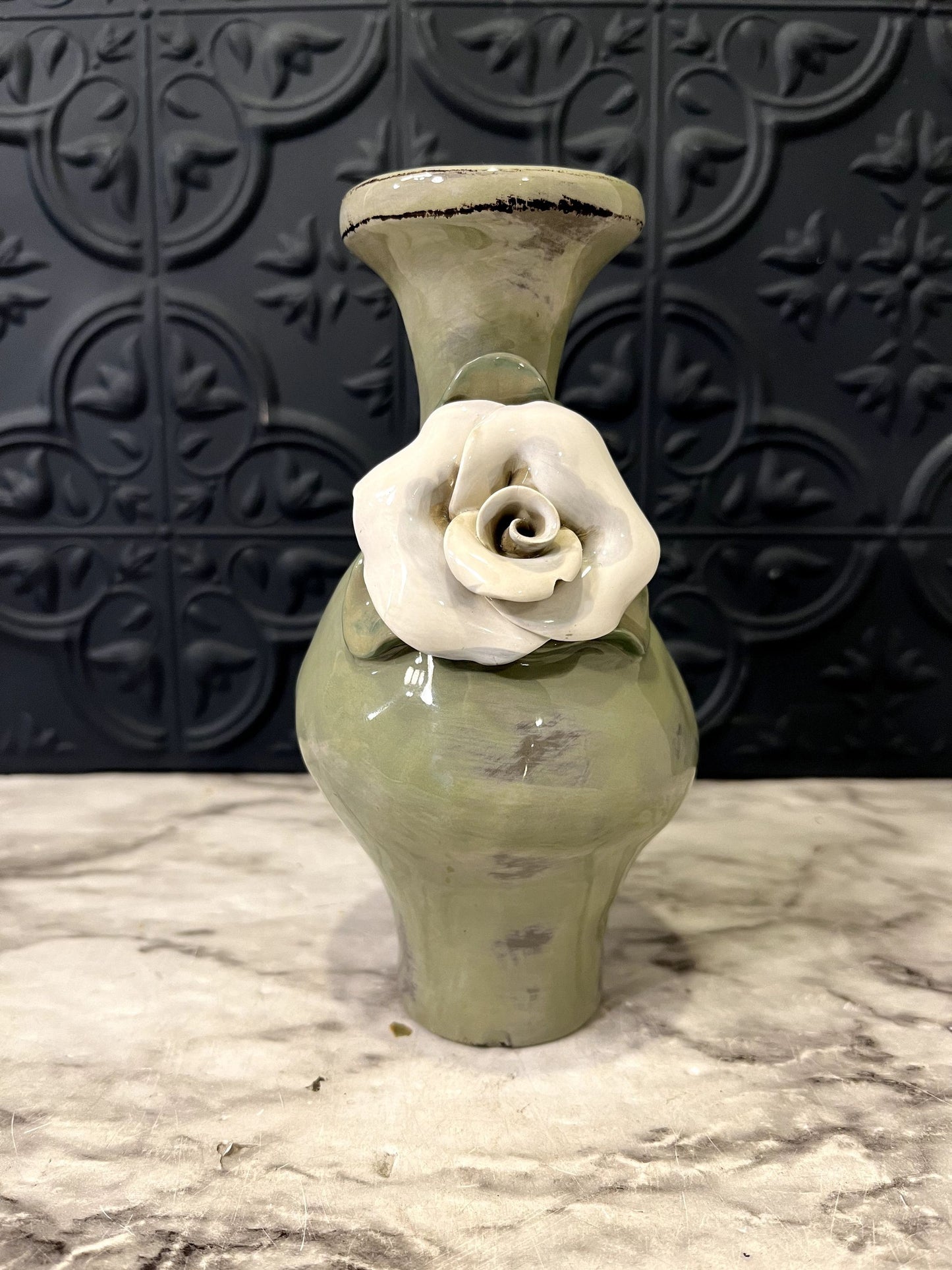 Green Pottery Vase With White Rose