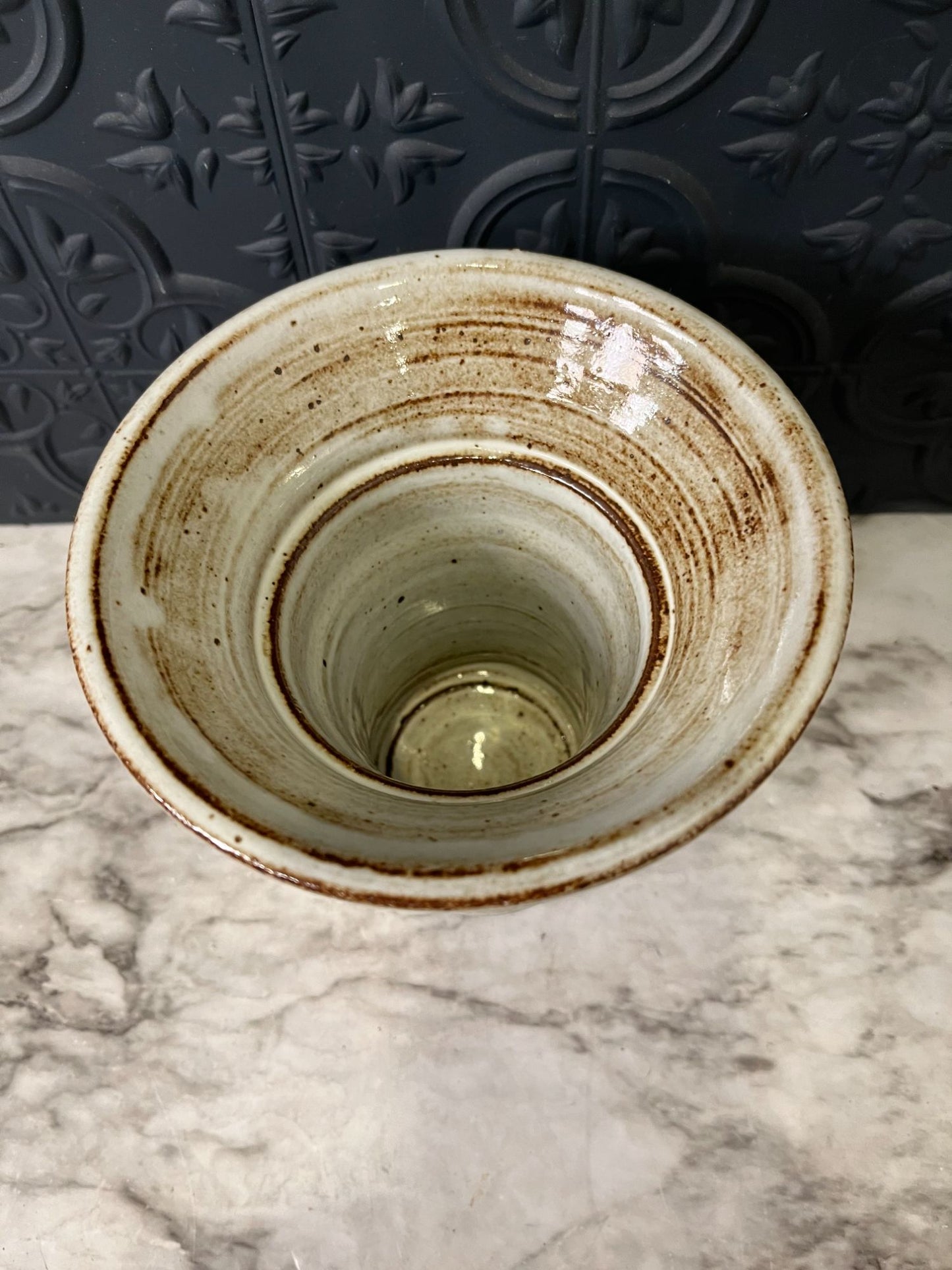 Gray/tan pottery vase wide top