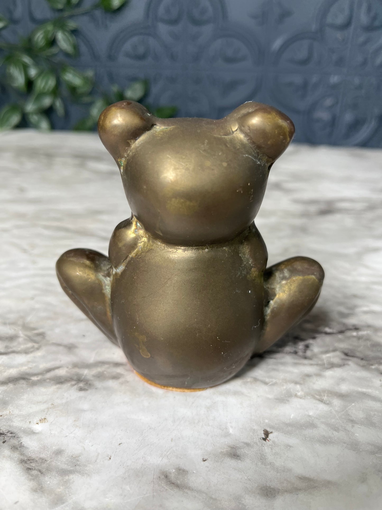 Brass teddy bear