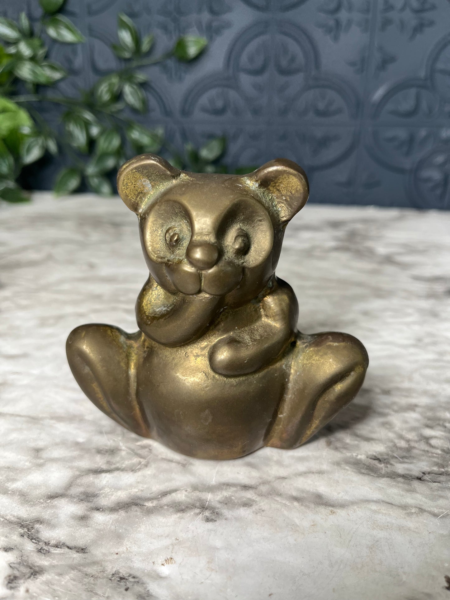 Brass teddy bear