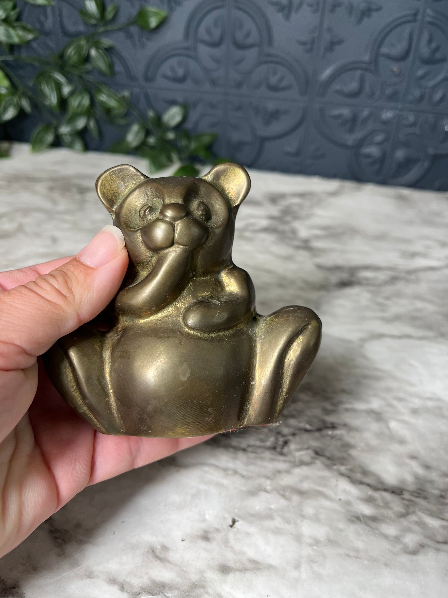 Brass teddy bear