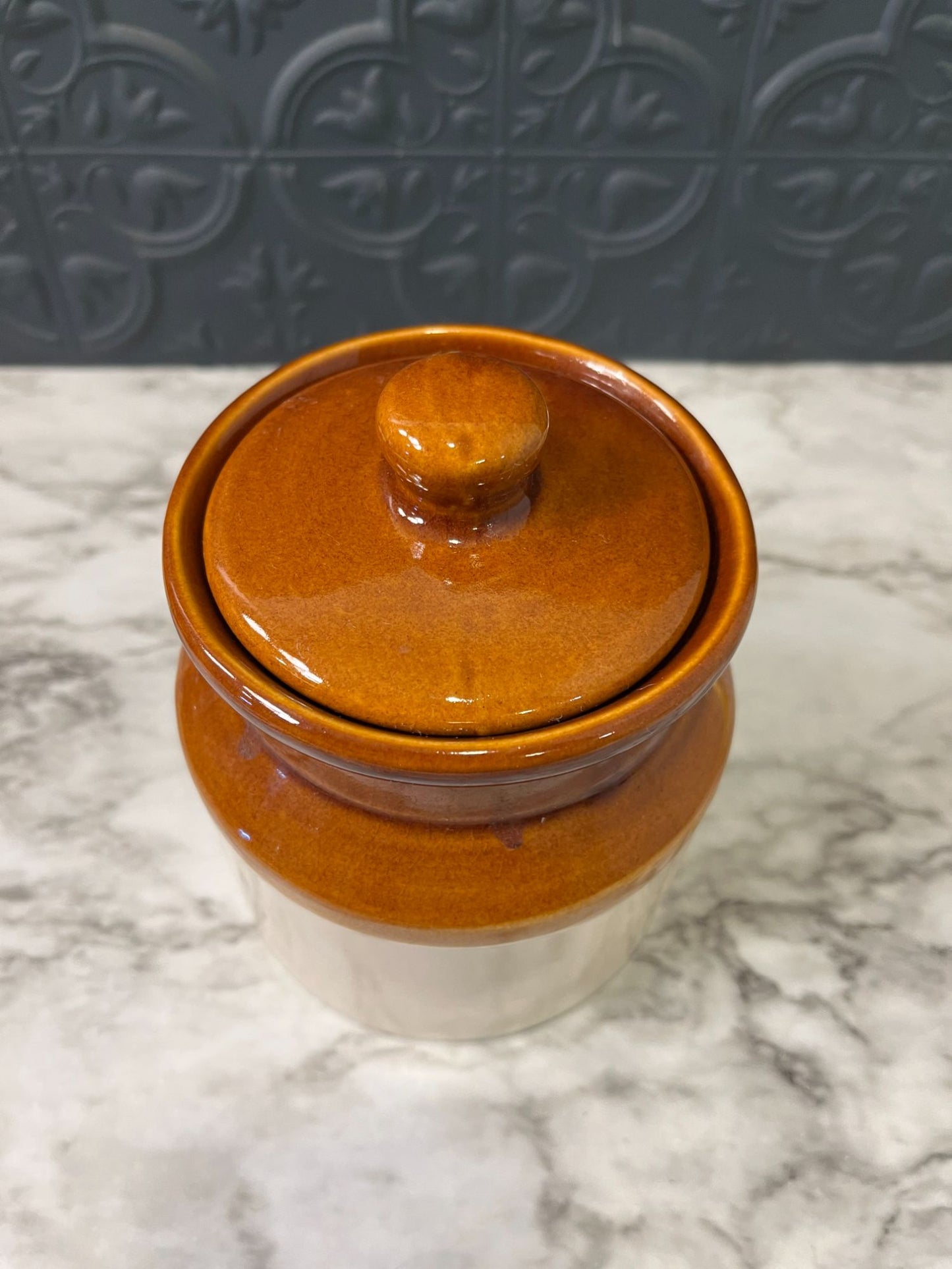 Brown and cream crock