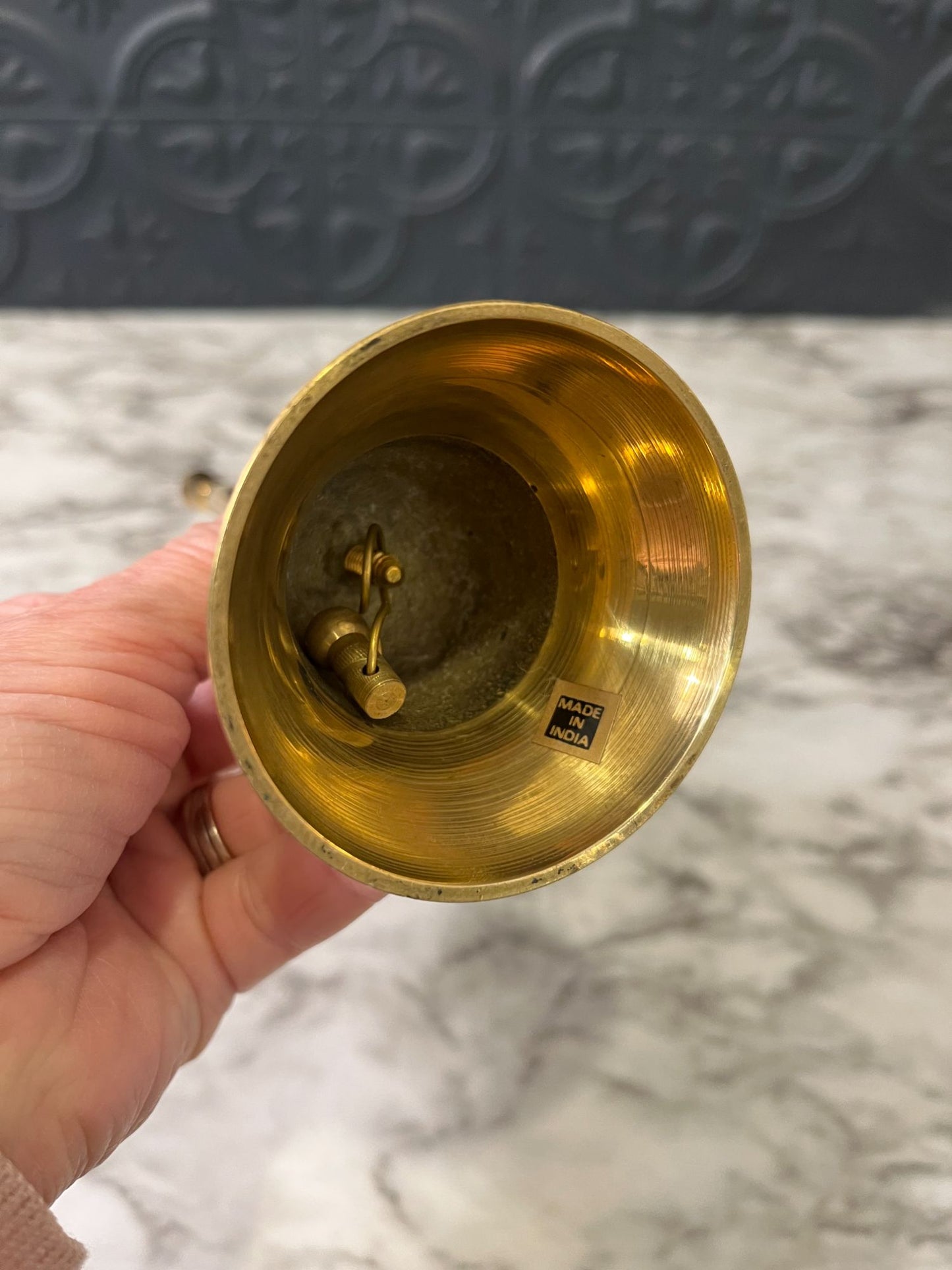 Cloisonné brass bell with pink flower