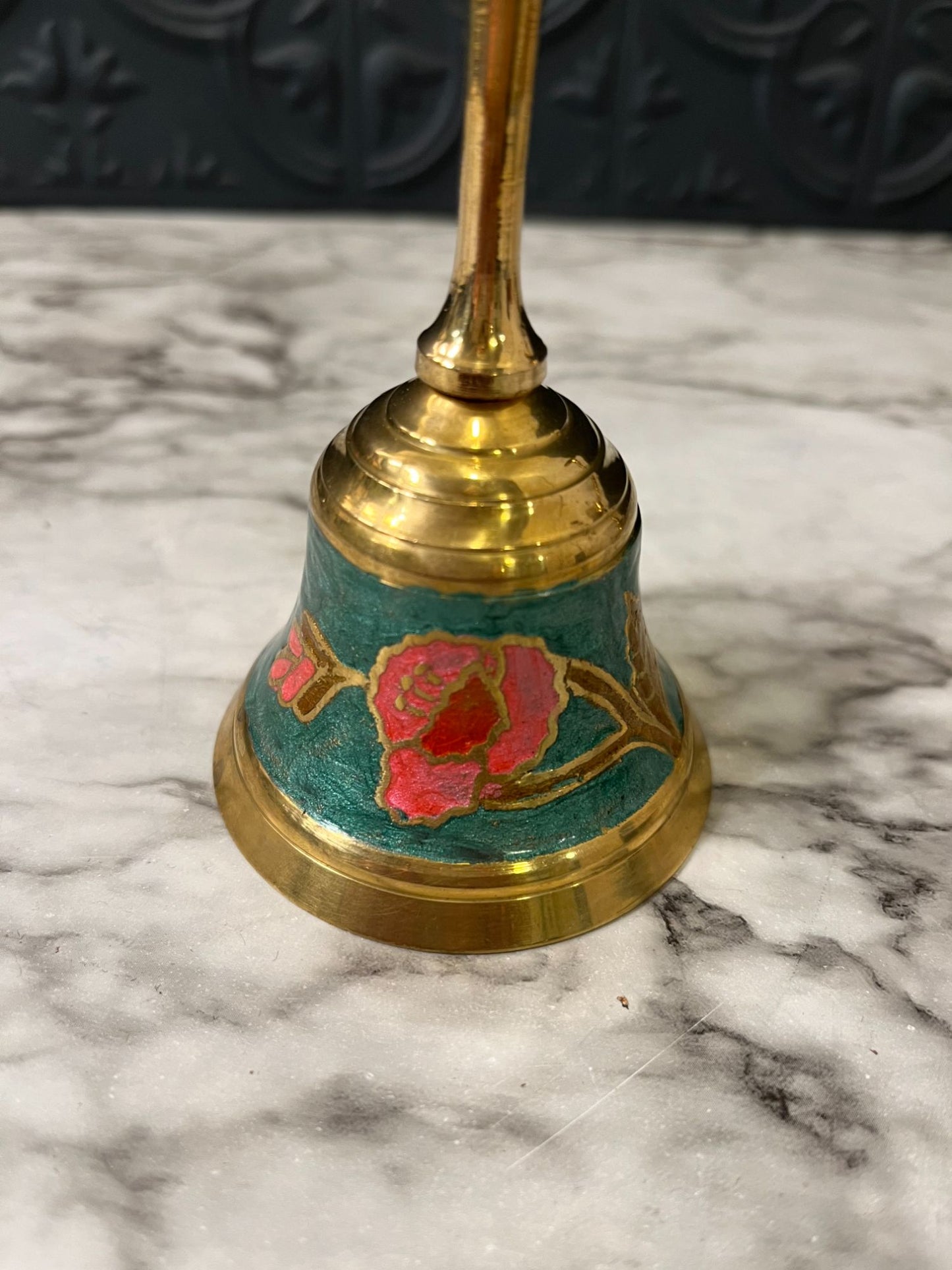 Cloisonné brass bell with pink flower